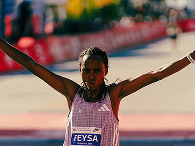 Hawi Feysa celebrates winning the Bank of America Chicago Marathon