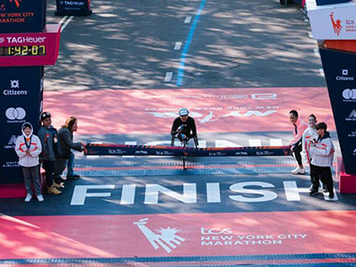 Marcel Hug crosses the line in New York City